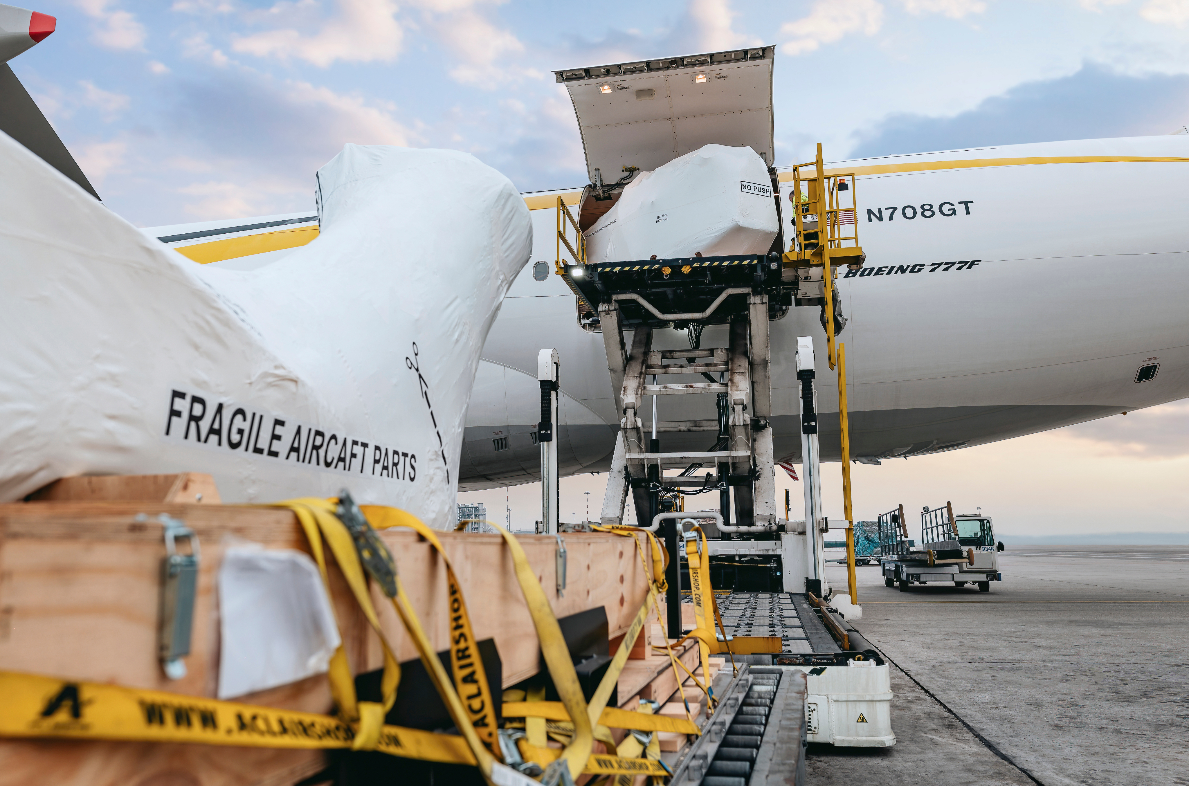 Helicopter parts being securely loaded onto MSC Air Cargo aircraft