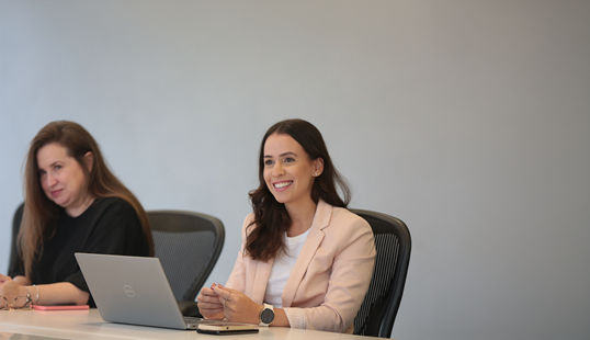 Two MSC employees smiling