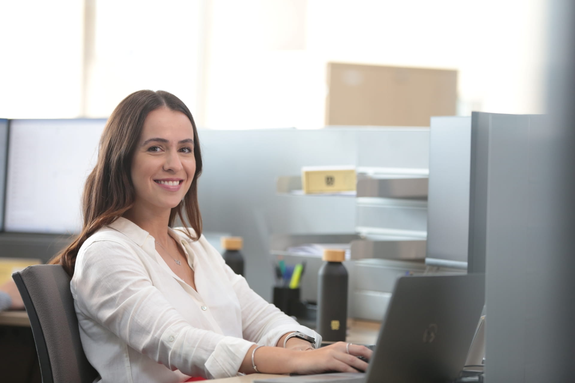 MSC woman employee working on her desk
