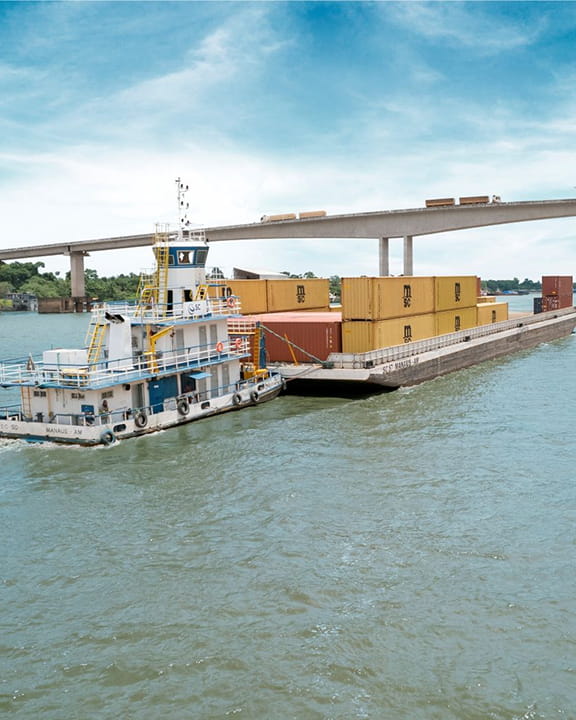 Barge full of yellow MSC dry containers