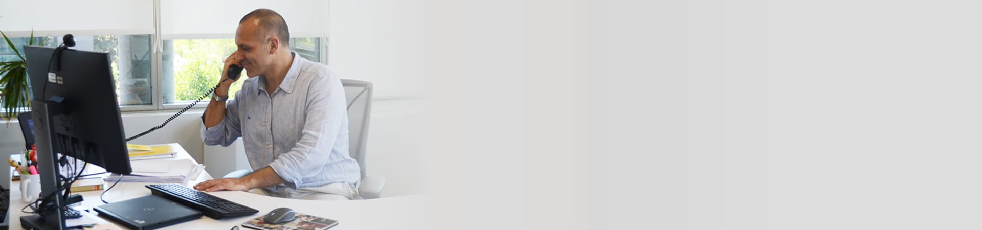 MSC employee at his desk