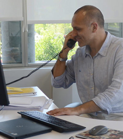 MSC employee at his desk