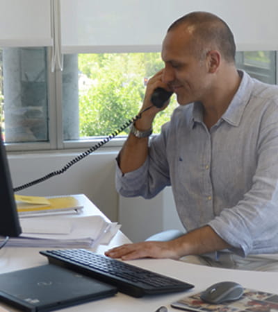 MSC employee at his desk
