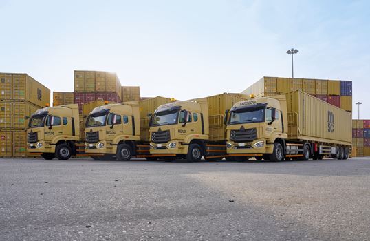 MEDLOG trucks carrying MSC containers in depot in Dammam, Saudi Arabia