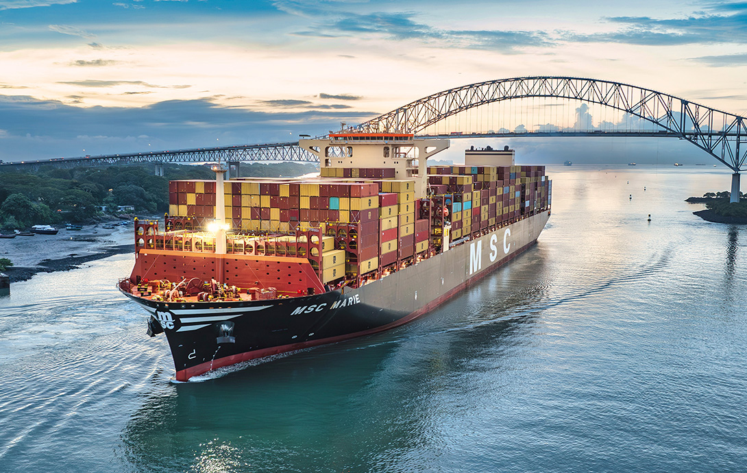 MSC Marie sailing under a bridge