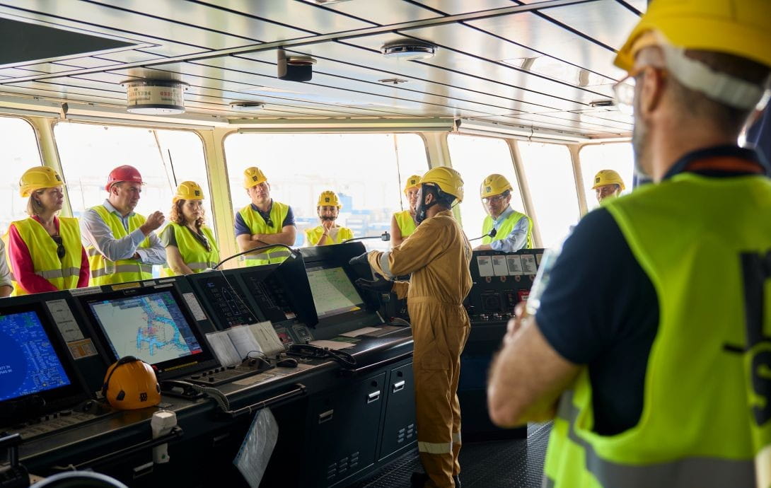ship crew standing next to each other