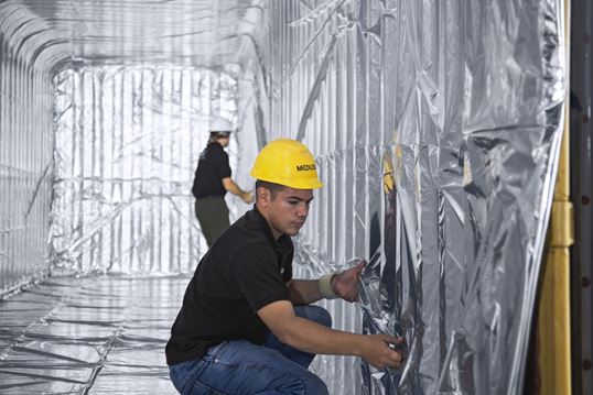 MSC Employee checking the installation of thermal liner